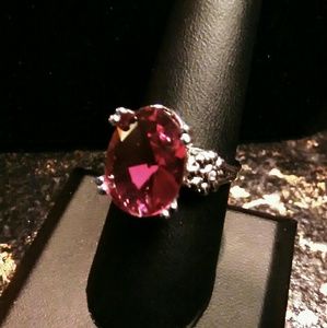 Large oval red zircon ring